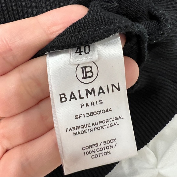 Balmain black crew neck sweater with white velvet medallion. - Picture 3 of 7